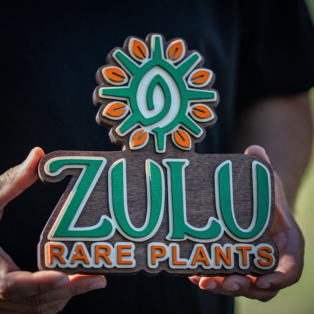 Custom layered wooden Zulu Rare Plants sign made from Baltic Birch plywood for plant shop decor