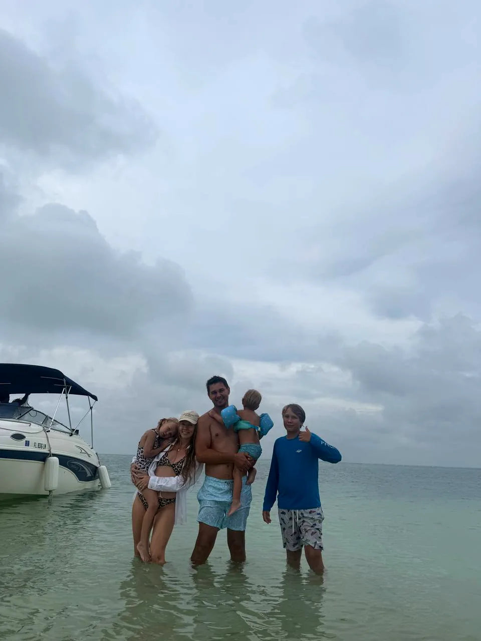 WoodHarmonyUS family enjoying a day on the water in Florida, taking a short break from making custom wood signs.