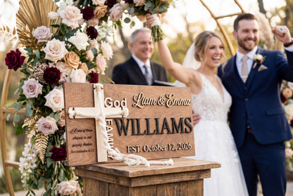 Wedding party gathered around a cord of three strands sign with black 3D lettering