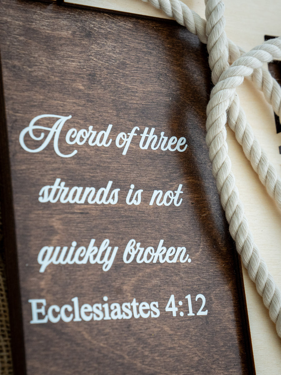 White scripture against the walnut finish