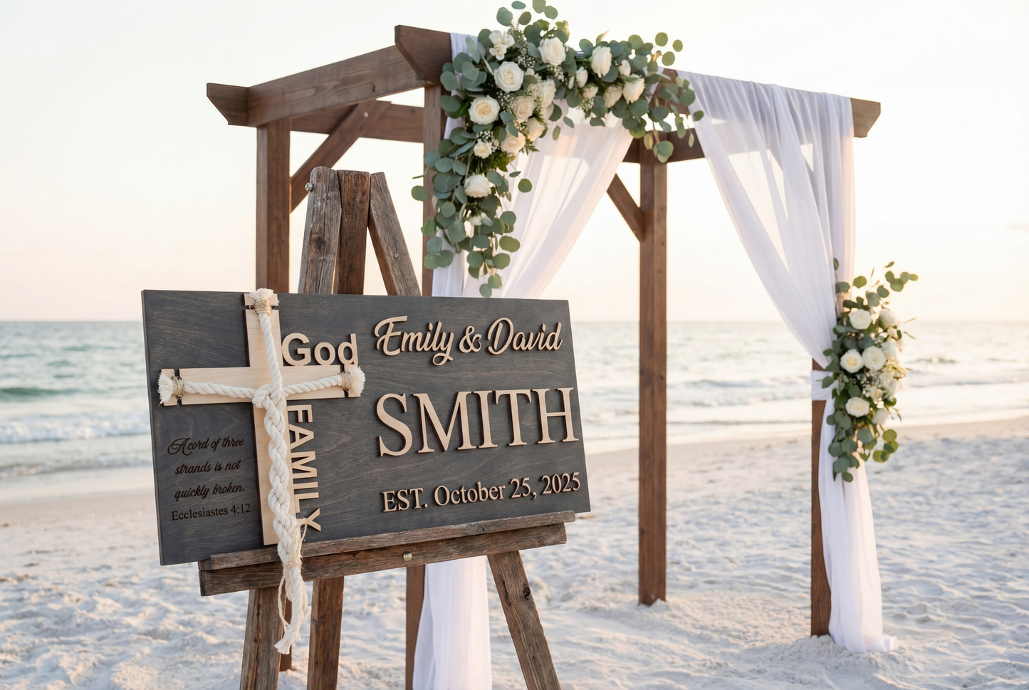 Grey Unity Cross Wedding Ceremony Sign with personalized names and date on a beach.